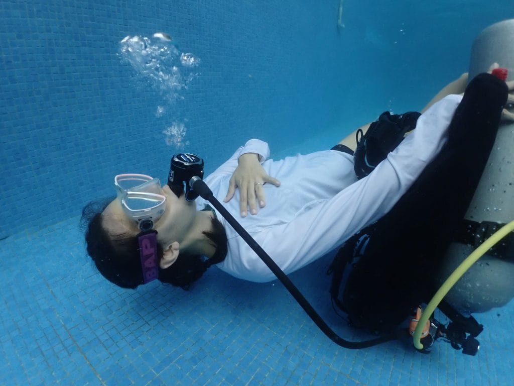 Underwater meditation laying down
